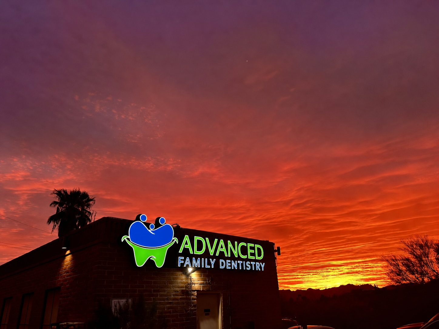 Advanced Family Dentistry office on North Oracle Road in Tucson at sunset